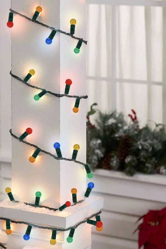 Christmas Cozy Nights 70 LED Indoor/Outdoor G12 Round Bulb Green Cable Christmas String Lights - Multicolor