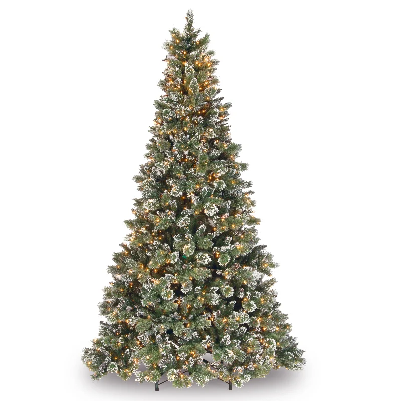Christmas Hot Chocolate 9 ft. Pre-Lit Glittery Bristle Pine Tree with Clear Lights Christmas Hot Chocolate 9 ft. Pre-Lit Glittery Bristle Pine Tree with Clear Lights