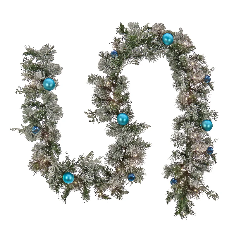 Christmas Dinner 9 ft. Pre-Lit Snowy Tinkham Pine Garland with LED Lights